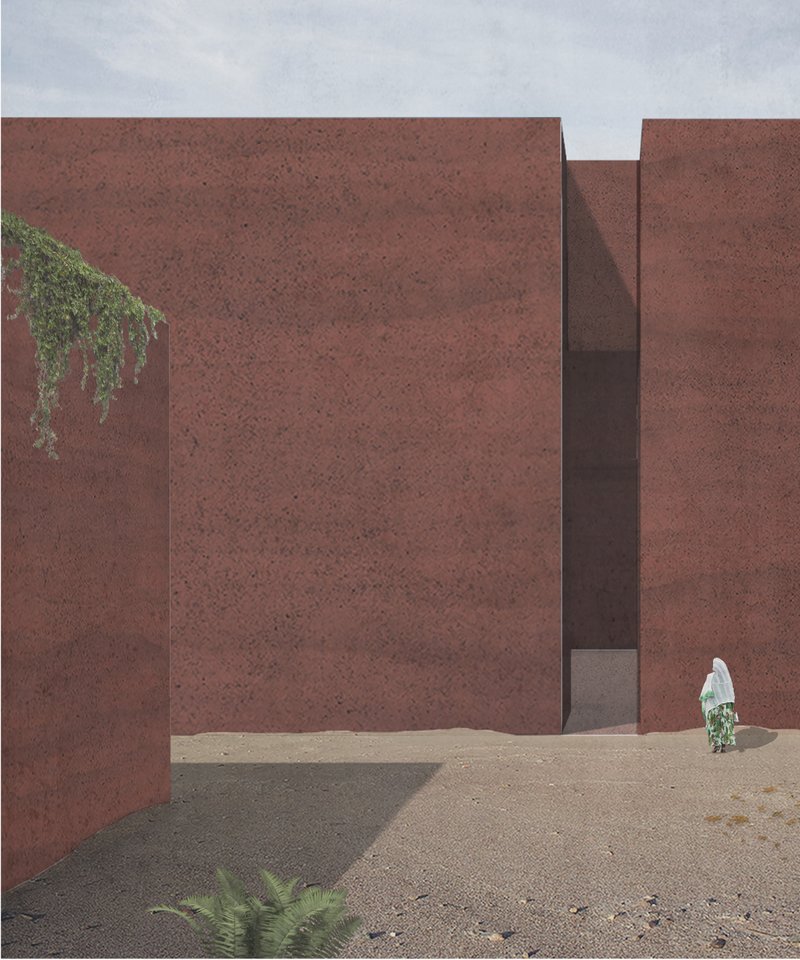 Rift-like entrance framed by massive red earth walls, creating a quiet threshold into the chapel.