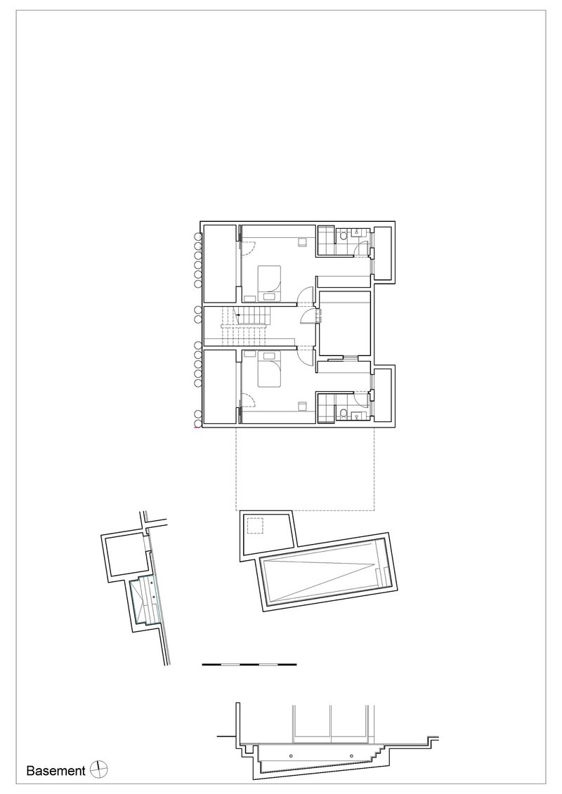 Basement floor plan drawing showing upper level rooms and angled structures below