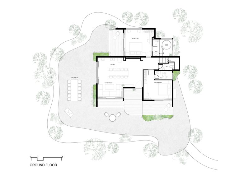 Ground floor plan drawing showing open living and dining spaces with terrace and landscaped perimeter