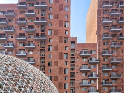 MVRDV and Studio Archohm Wrap 437 Apartments Around a Courtyard the Size of Two Football Fields