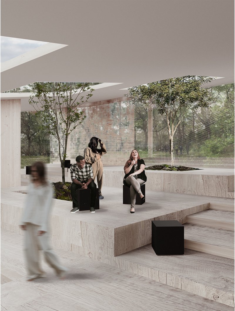 A light-filled gathering area where architecture and nature merge through shared public spaces.