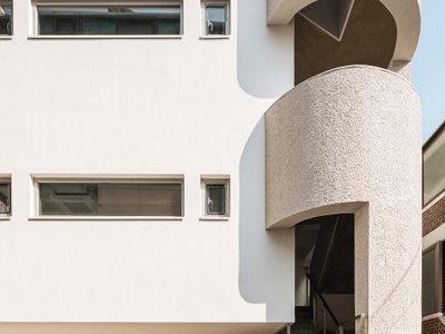 Studio Stuckyi Wraps a Mangwon Commercial Building Around a Flagpole Staircase