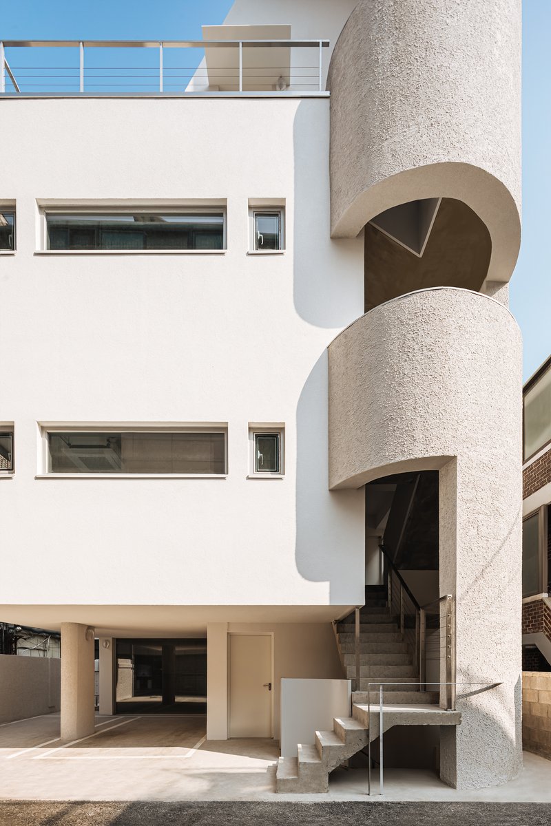Studio Stuckyi Wraps a Mangwon Commercial Building Around a Flagpole Staircase