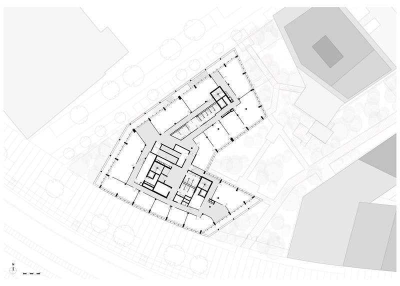 Floor plan drawing illustrating an angled perimeter with interior rooms clustered around a central core