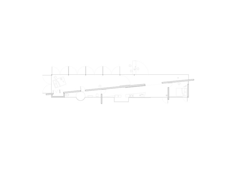 Section drawing showing the elongated interior spaces with exposed structural columns