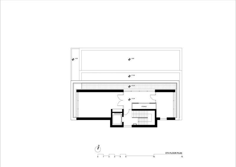 Fifth floor plan showing a central stair core flanked by two large open areas