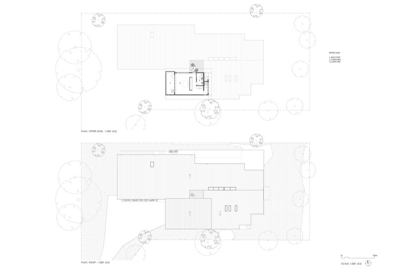 Floor plan drawings showing the upper level and roof level with linear roof patterns and tree placement
