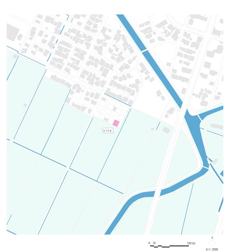 Site plan drawing showing the building location marked in pink among agricultural plots and waterways