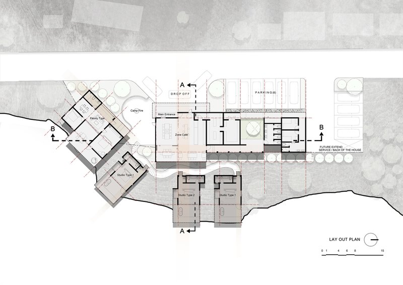 Site plan drawing showing angled pavilions and a linear service spine on sloping terrain
