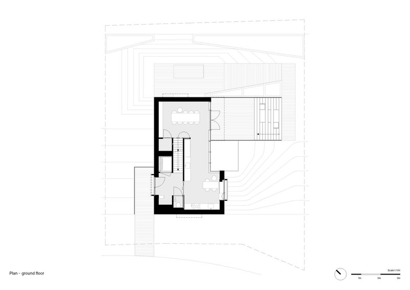Ground floor plan drawing showing L-shaped layout with thick walls and surrounding topographic contours
