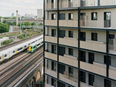 Studio Woodroffe Papa Wraps 111 Apartments Around a Courtyard with Saw-Tooth Balconies in Bermondsey