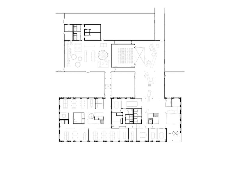Floor plan drawing showing office layout with central courtyard and perimeter workspaces