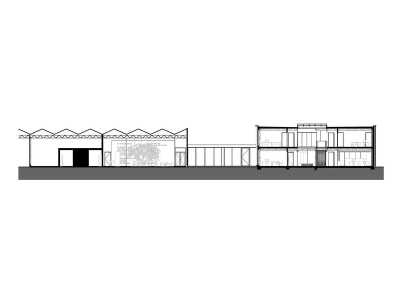 Section drawing revealing a complex with sawtooth roof on the left and two-story volumes on the right