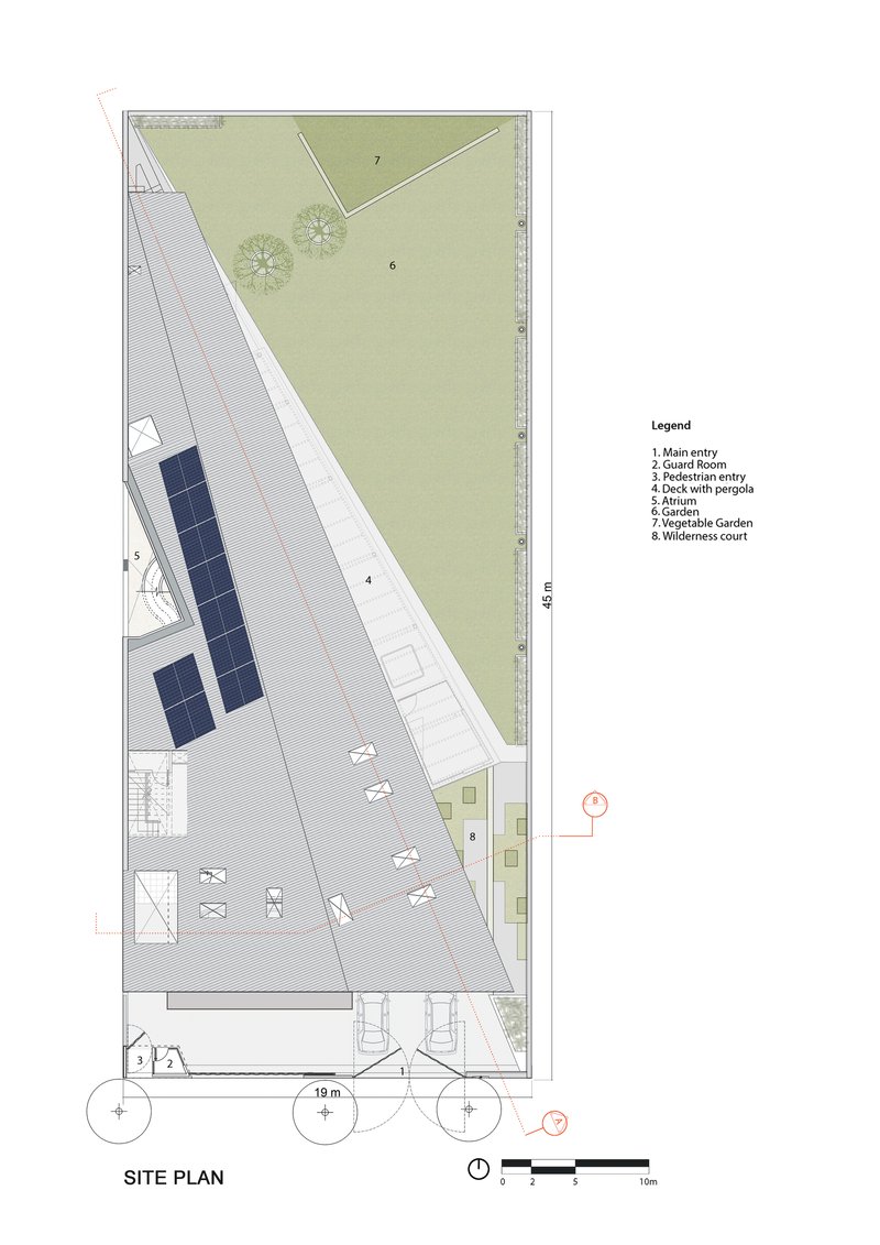 Site plan drawing showing triangular building footprint with adjacent lawn and tree placements