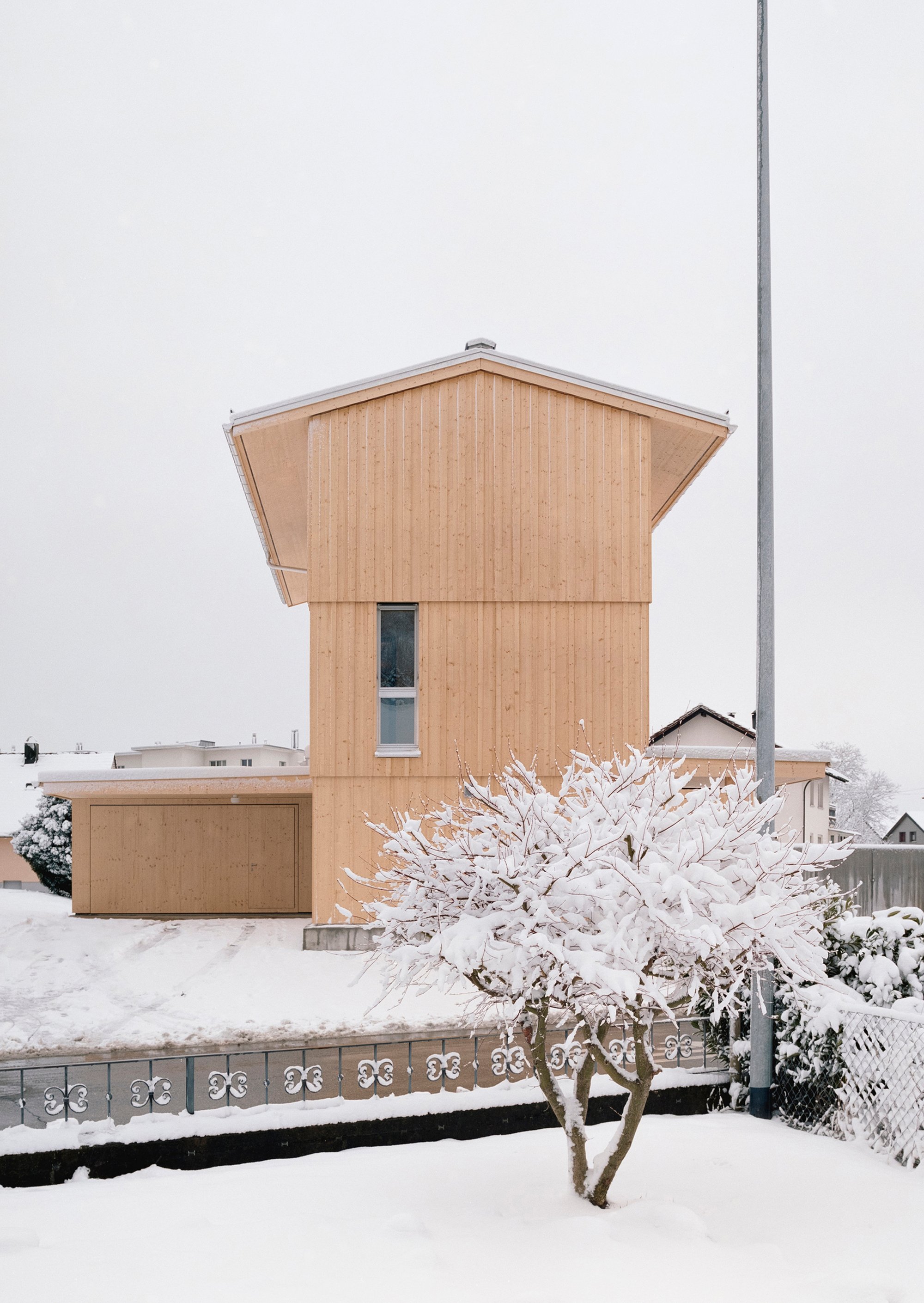 kit Architects Stack a Timber Tower House on a Triangular Plot in the Swiss Rhine Valley