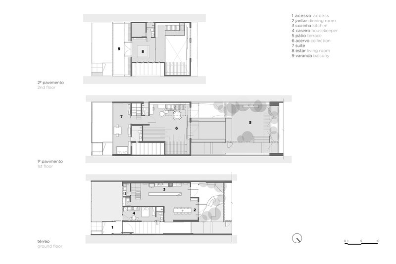 Floor plan drawing showing three levels of a narrow residential layout with central staircase