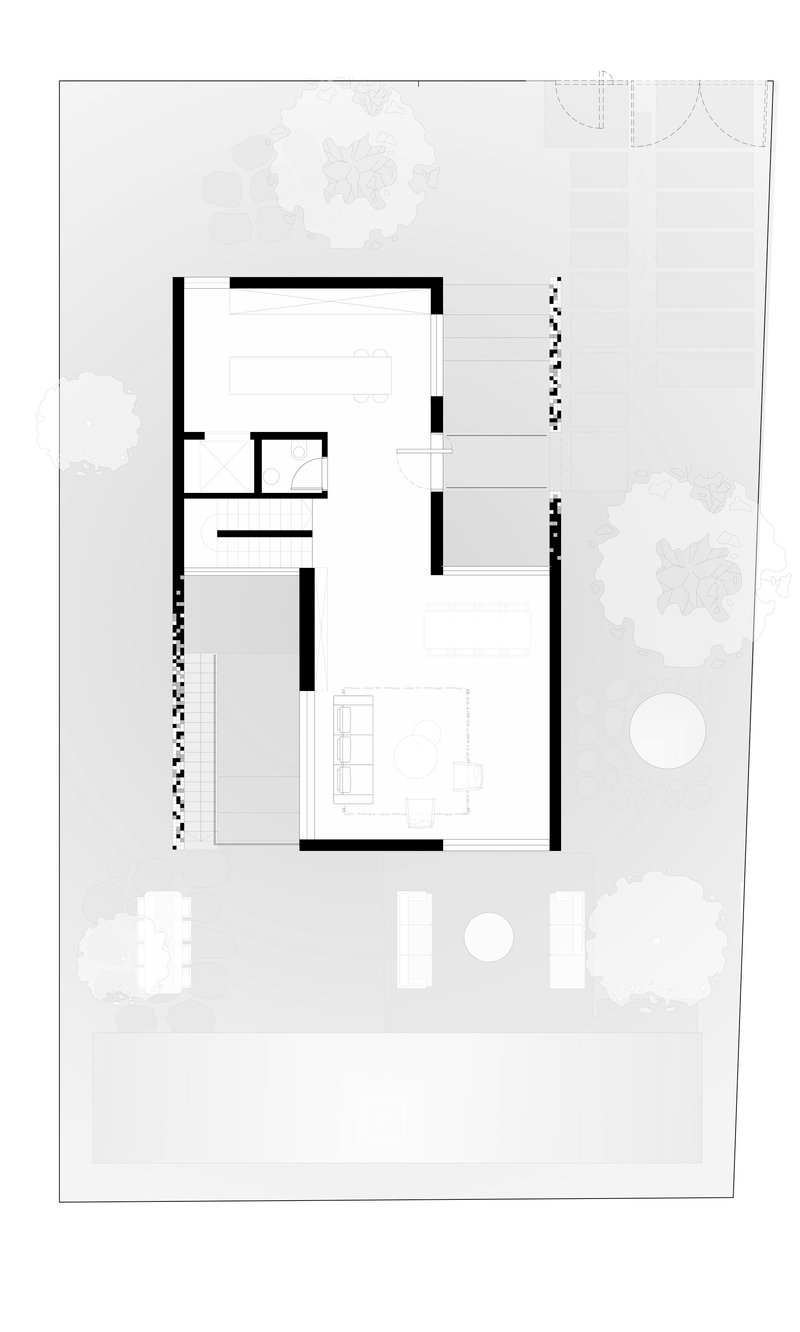 Site plan showing the residence footprint with surrounding garden beds and tree canopies