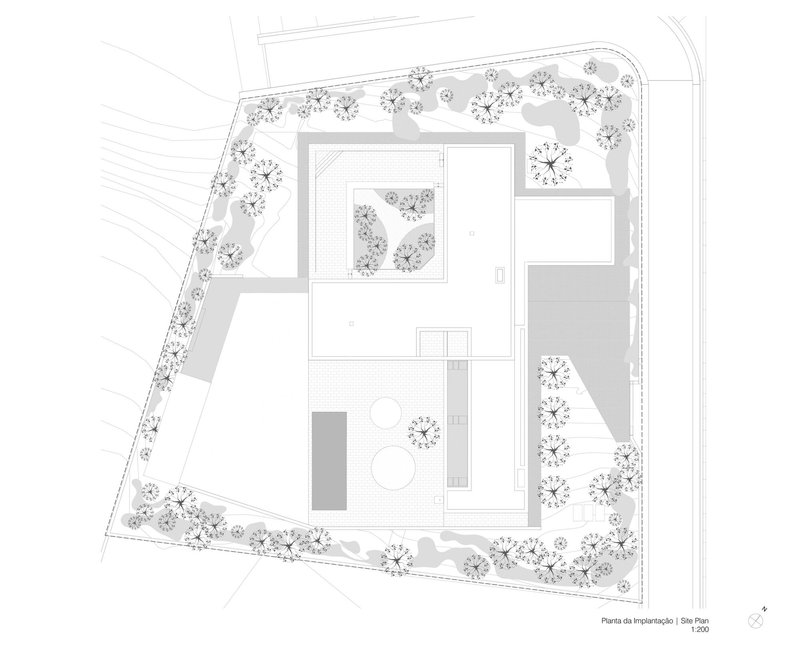 Site plan drawing showing building footprint surrounded by perimeter tree plantings