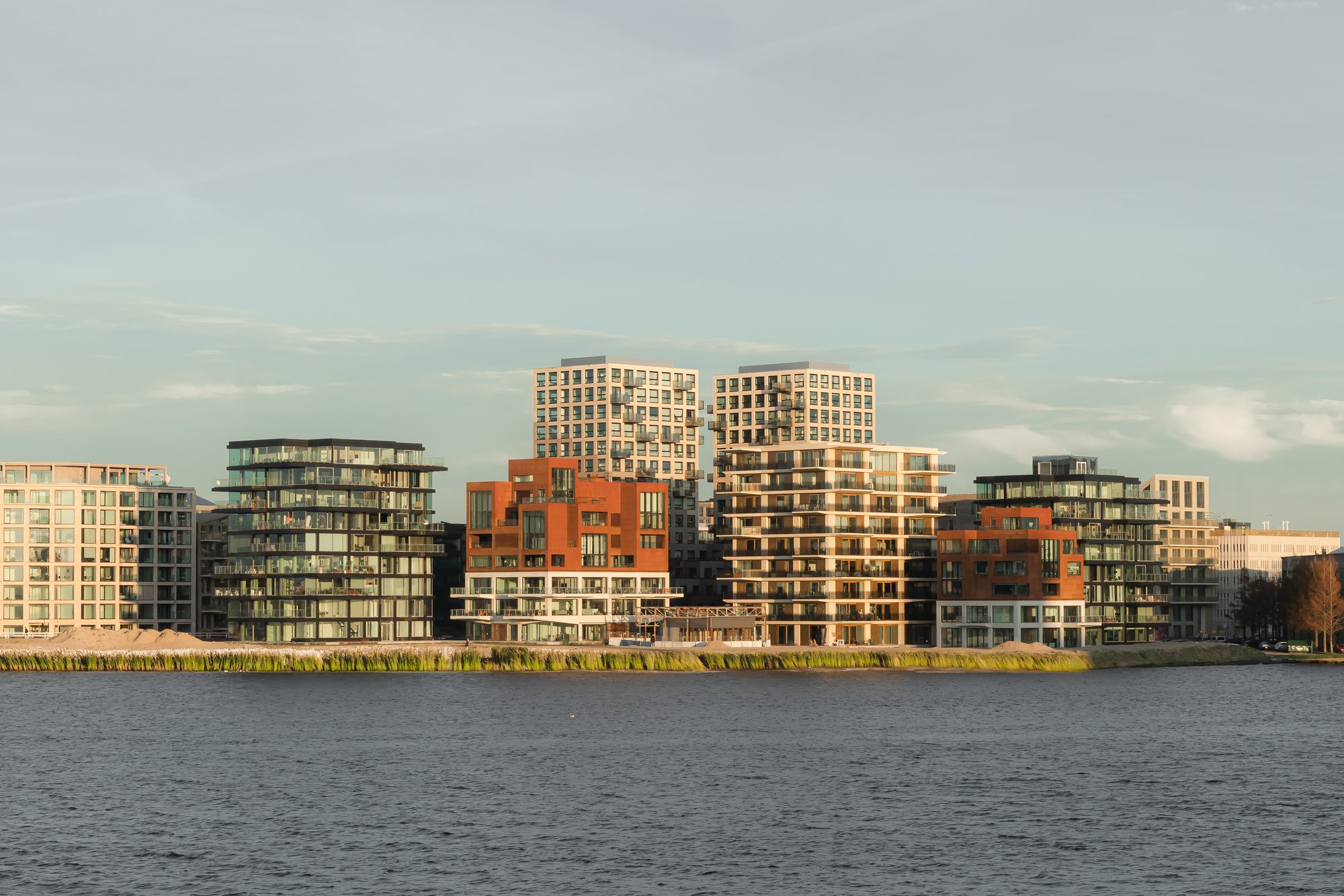 Powerhouse Company, Orange Architects, and NEXT Architects Build a Harbor District on Amsterdam's IJ