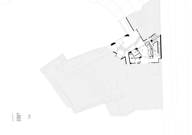 Floor plan drawing showing an amphitheater space with concentric seating arcs and adjacent support facilities