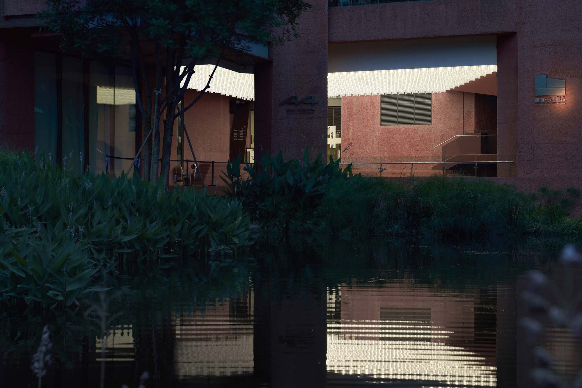 TEKTONN Architects Insert Sculptural Volumes into a Chengdu Garage to Create the A4 Art Museum