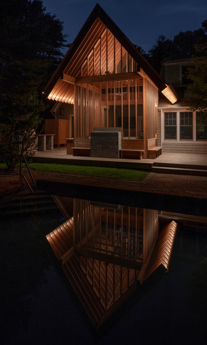BLDUS Turns a 250-Square-Foot Screened Porch into a Pine Forest Temple in East Hampton
