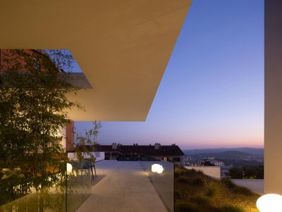 Visioarq Arquitectos Rehabilitates a Coimbra Villa into a Panoramic Layered Residence
