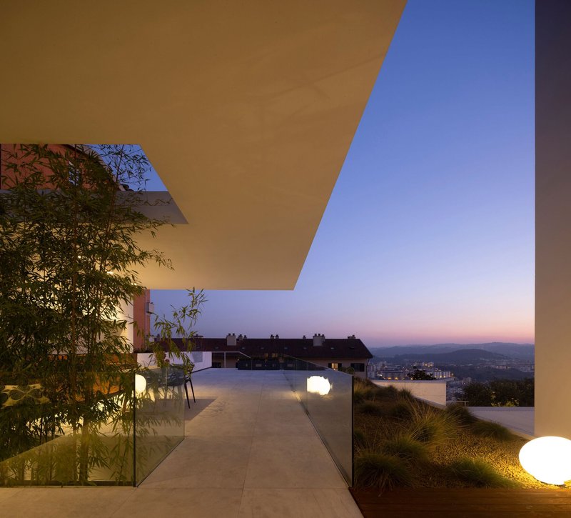 Visioarq Arquitectos Rehabilitates a Coimbra Villa into a Panoramic Layered Residence