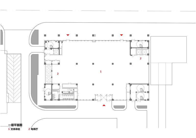 Ground floor plan drawing showing a large open hall flanked by service cores and staircases