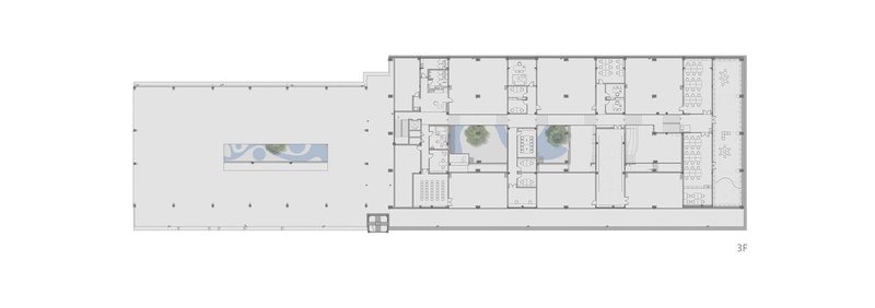 Floor plan drawing showing an open hall adjacent to smaller rooms with two planted courtyards