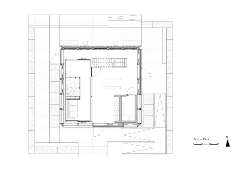 Ground floor plan drawing showing compact square footprint with stair, kitchen and open living area