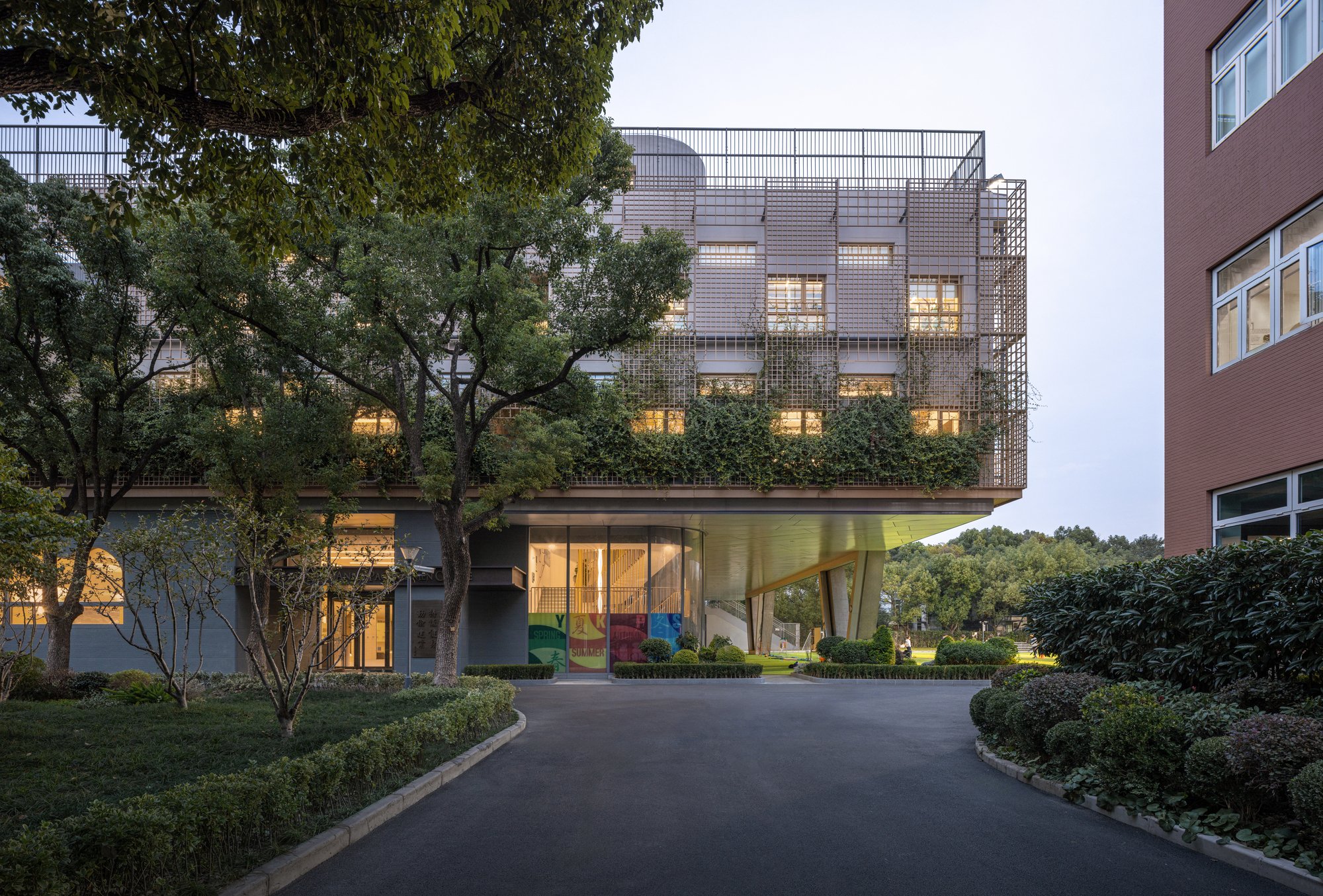 Scenic Architecture Office Lifts an Entire Sports Complex Above a Shanghai School's Playing Field