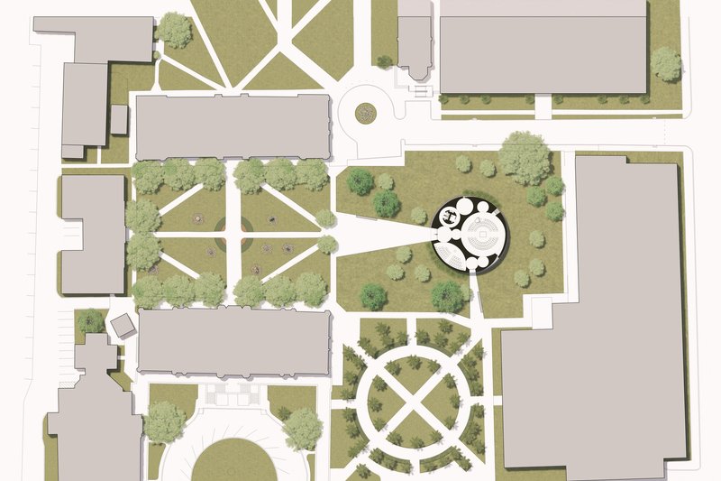 Site plan drawing showing a circular pavilion surrounded by landscaped grounds and adjacent buildings