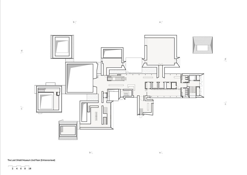 Floor plan drawing showing multiple pavilion volumes with stepped roof sections indicated