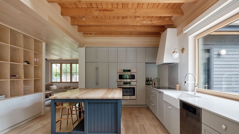 L. McComber Replaces a 1970s Bungalow with a Dark-Clad Prairie House in Quebec's Eastern Townships