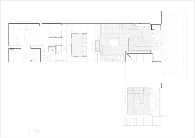 Floor plan drawing showing a linear layout with dining area and outdoor terrace