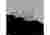 This architectural image presents an east elevation of a modern, minimalist building situated on a h