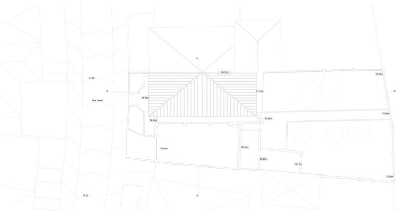 Roof plan drawing showing two gabled volumes joined by a connecting element with roof structure indicated