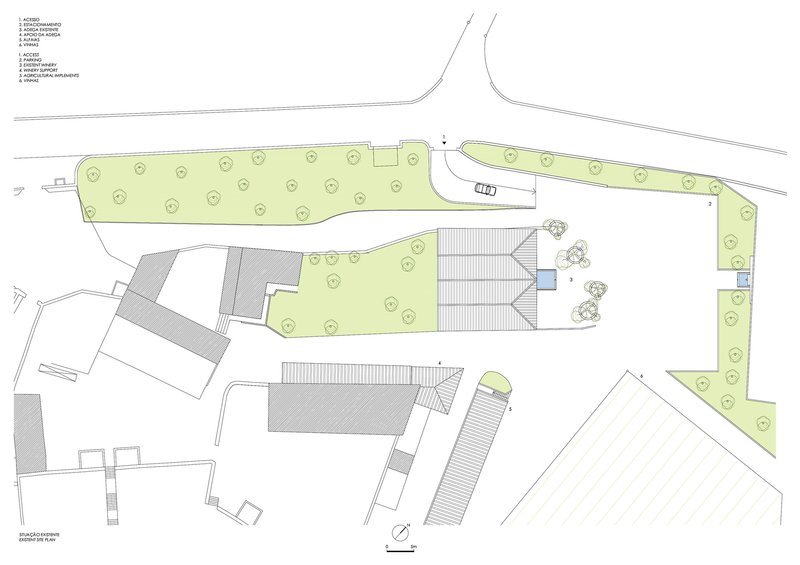 Site plan drawing showing multiple buildings arranged around green spaces with tree symbols