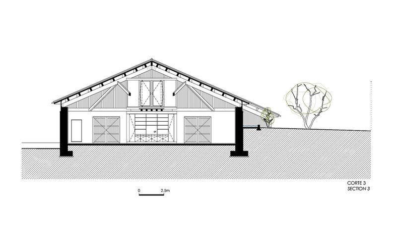 Section drawing showing double-height interior with mezzanine stair and flanking timber doors