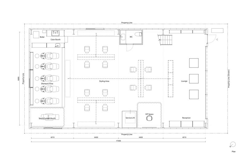 Floor plan showing shampoo area with five styling stations, lounge, and reception arranged around central services