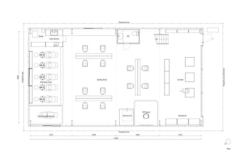 Floor plan showing styling area with paired seating stations and elongated service counter along the center