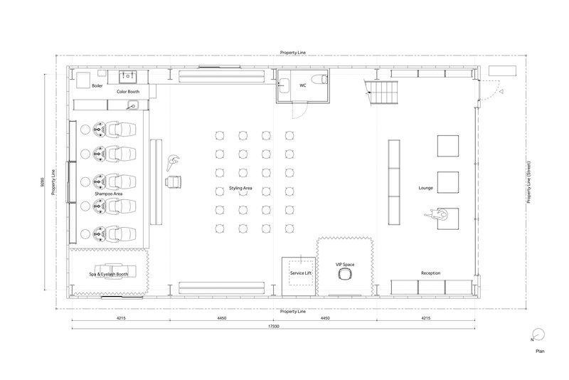 Floor plan showing open styling area reconfigured with rows of individual salon chairs facing the center
