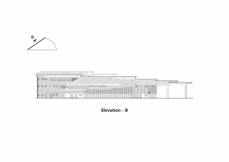 Elevation drawing showing a horizontal multi-story building with stepped rooflines and varied fenestration patterns