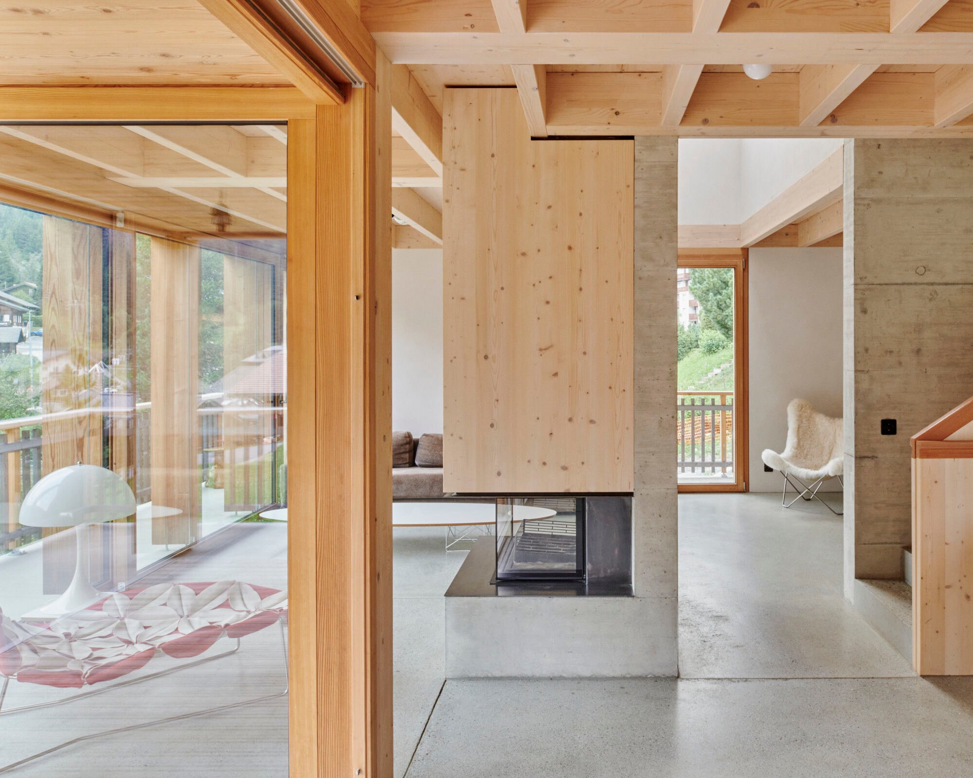 Gaillng Rickling Architectes Ground a Swiss Chalet in Concrete and Custom Carpentry