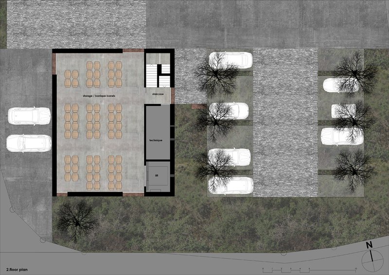 Second floor plan showing rows of seating in main room with stairwell and service areas