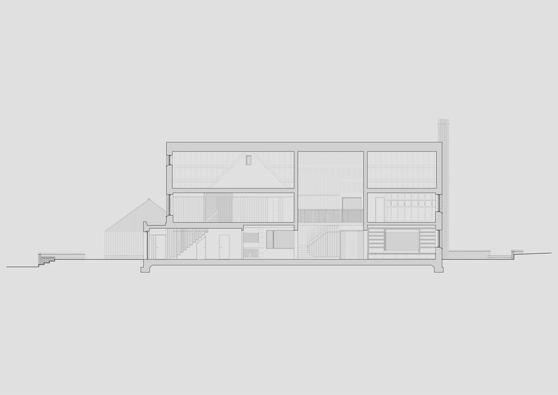 Section drawing showing interior spatial divisions with clerestory windows and a stair connection