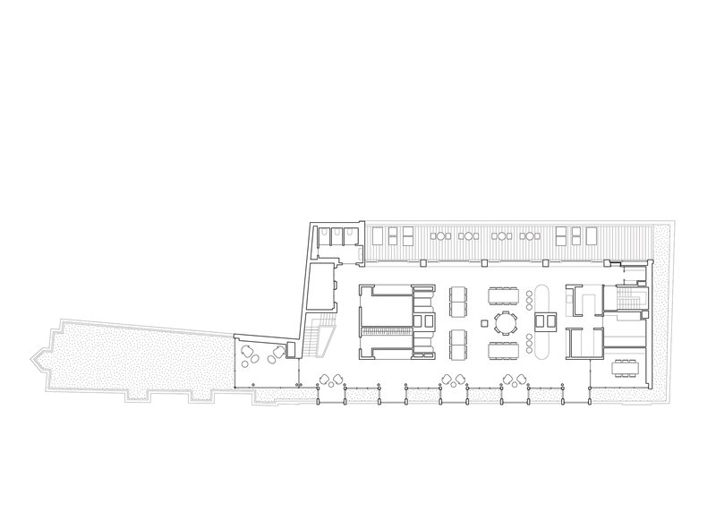Floor plan drawing showing residential spaces with kitchen, dining and terrace areas