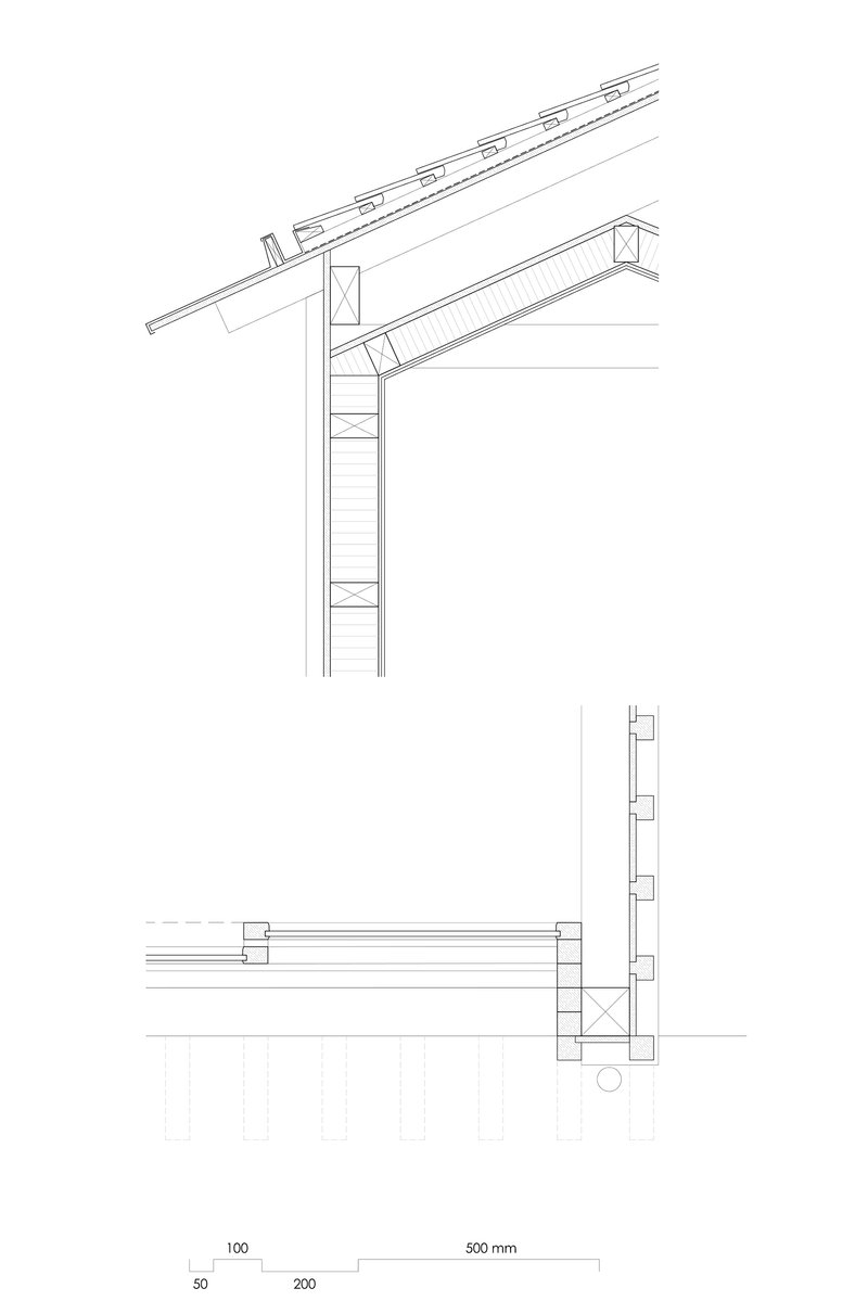 Construction detail drawings showing the roof eave connection and wall assembly with scale dimensions