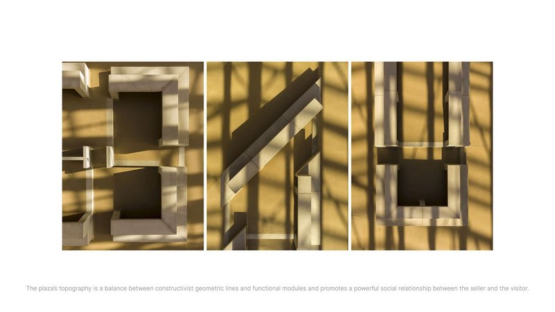 Architectural model photographed from above showing geometric timber volumes casting dappled sunlight shadows